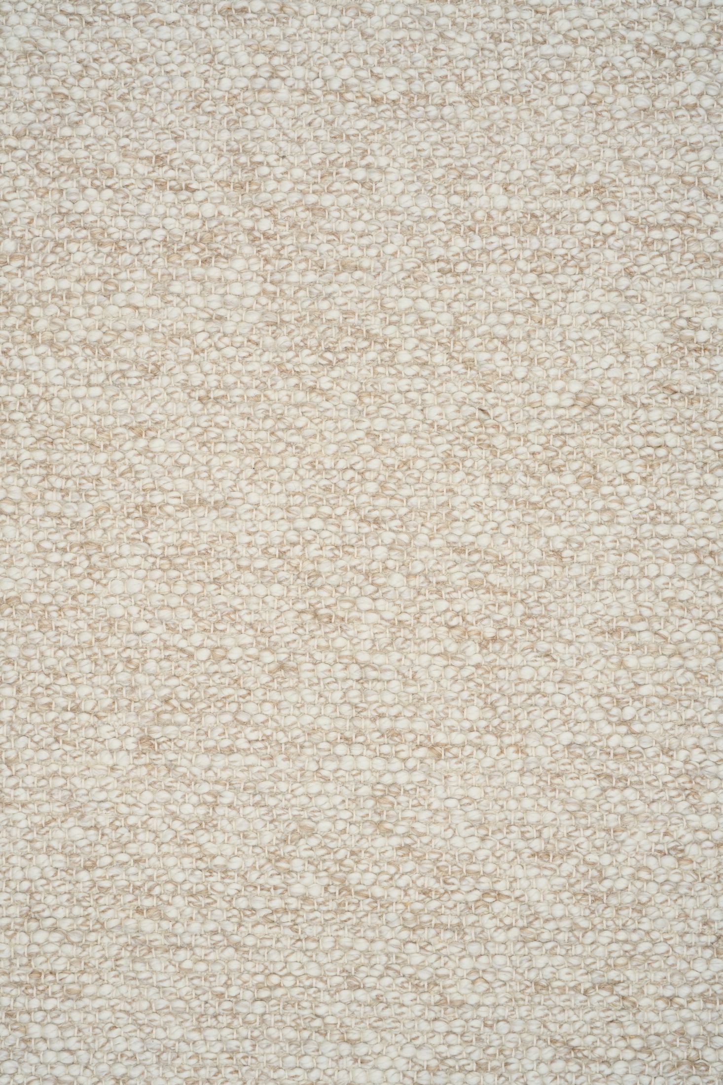 Sahara Wheat Rug – hand woven 100% wool rug in soft neutral tones with a textured finish, available in three sizes, styled for modern and coastal homes. Close.