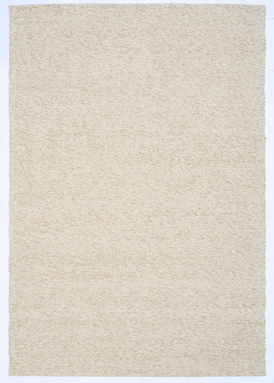 Sahara Wheat Rug – hand woven 100% wool rug in soft neutral tones with a textured finish, available in three sizes, styled for modern and coastal homes. Top.