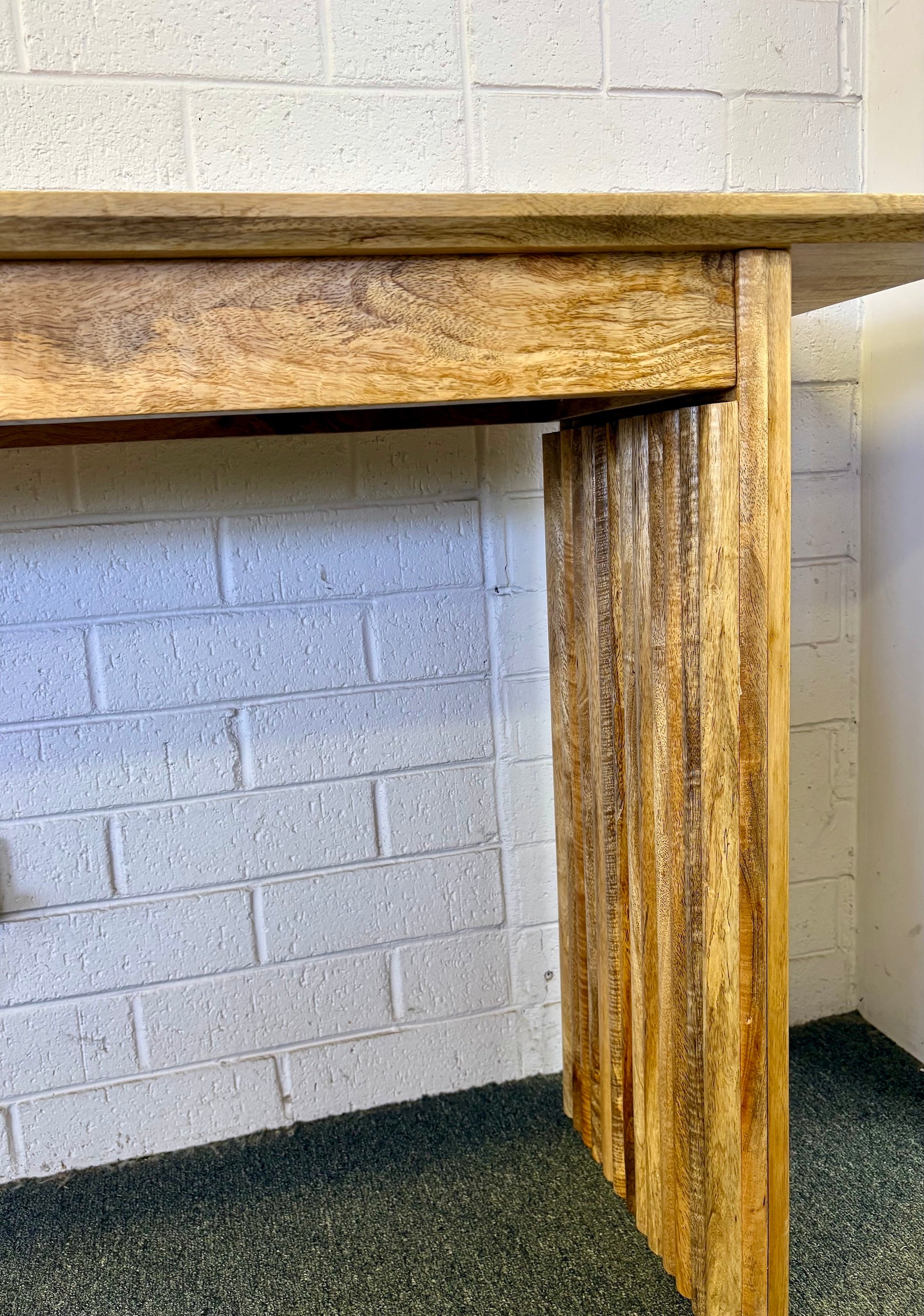 The Salzburg console, stylish and modern, this console is crafted from sustainable fruitwood and features textured legs. Colour natural. Measures 1700 length X 350 depth X 750 height. Leg.