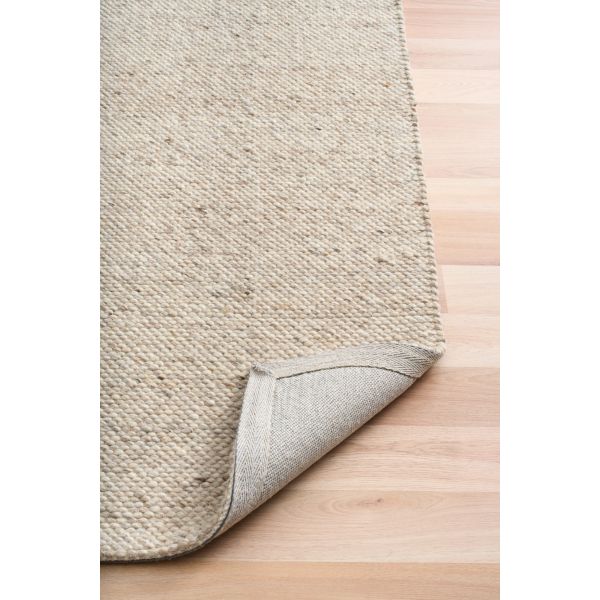 Savoy Beige is a hand-woven wool flatweave rug in an oatmeal neutral, with a fine box-weave texture. 4 size options. Fold.