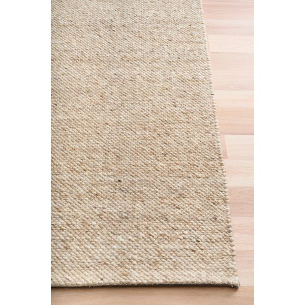 Savoy Brown hand-woven wool flatweave rug in a warm earthy brown, with a fine box-weave texture. 4 Size options. Corner.