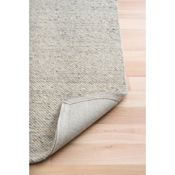 Savoy Grey hand-woven wool flatweave rug in a cool, understated grey, with a fine box-weave texture. 4 Size options. Fold.