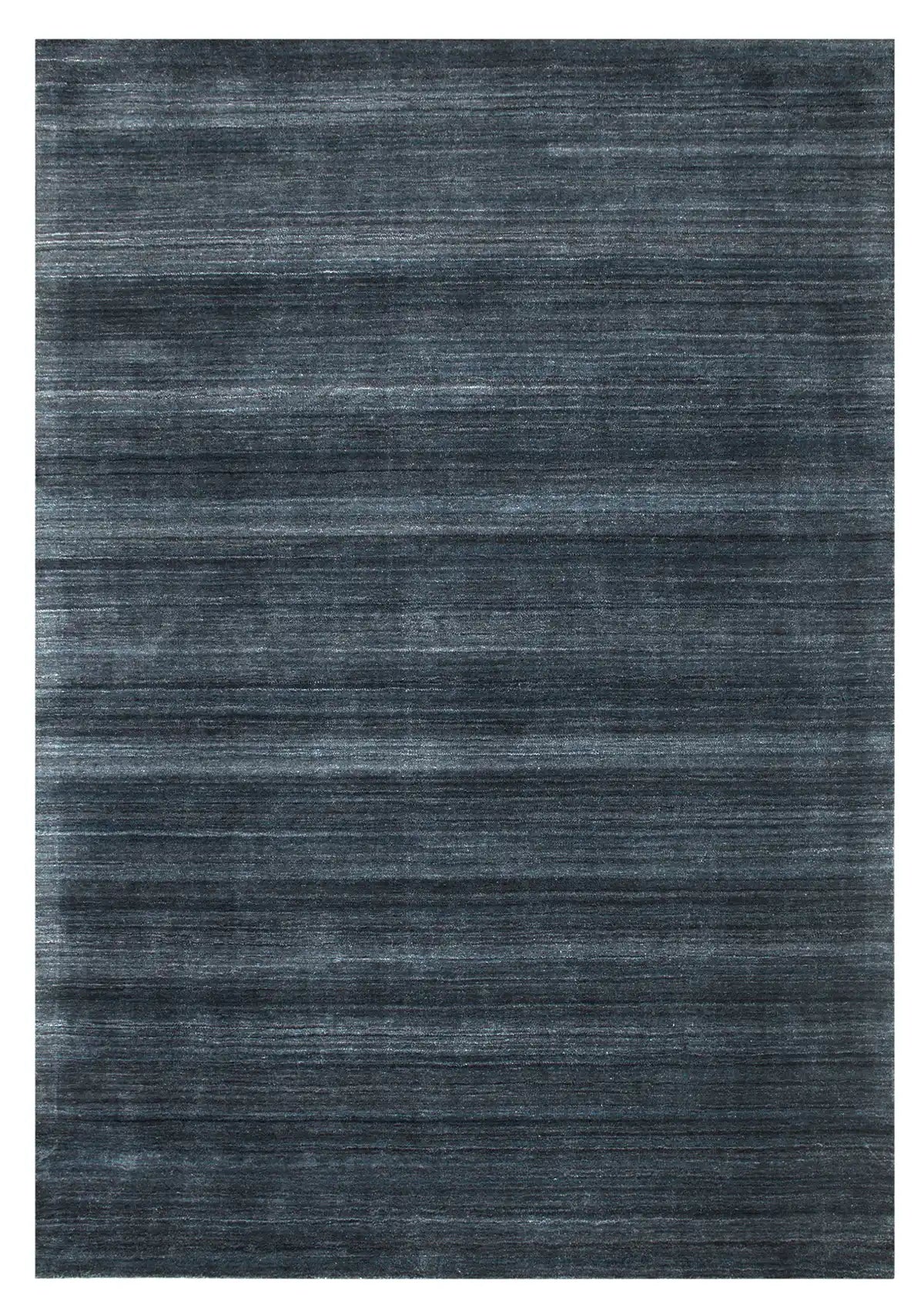 Shadow Sea Green is a hand-tufted rug from a blend of wool and silky viscose with a smooth pile and a 12-14mm pile height. Colour Dark green with grey and black accents. Sizes 160 X 230, 200 X 290 and 240 X 340. Full.
