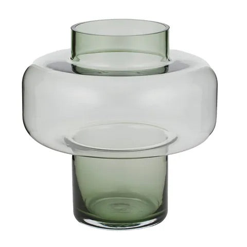 The Svend Glass Vase, a modern/contemporary deigned vase. Featuring a cylindrical bottom and top with a bulbed middle. Colour, light green. Measures 24 Diameter X 24.5 Height. Front Plain.