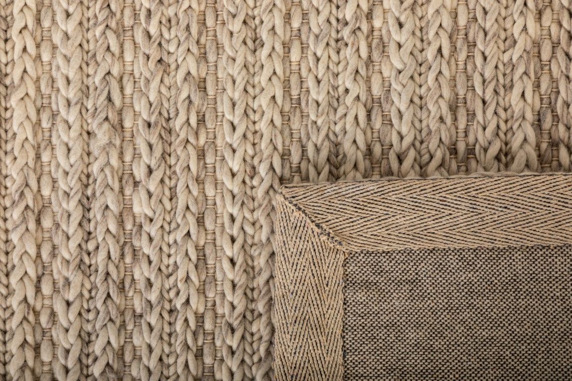 Svend Greyology is a contemporary hand woven braided pile wool rug.  Colour Light Grey. Sizes 155 X 225, 200 X 290 and 300 X 400. Fold.