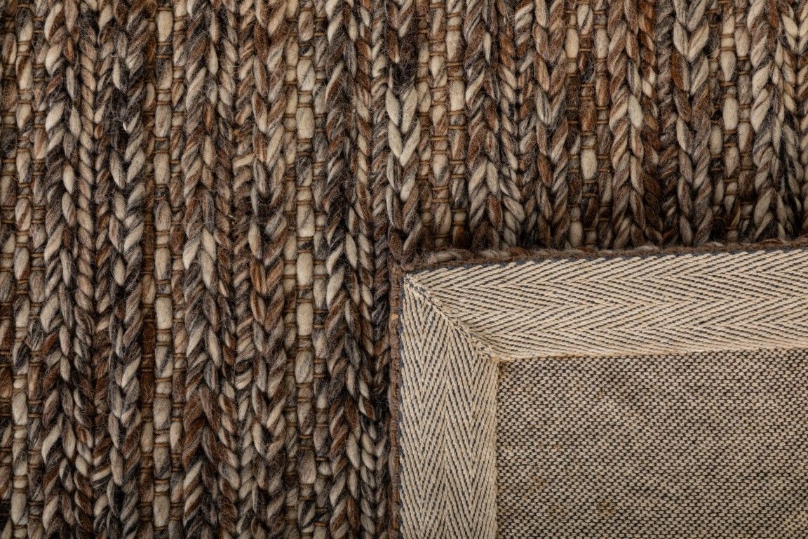 Svend Mocha is a contemporary hand woven braided pile wool rug.  Colour Mocha brown. Sizes 155 X 225, 200 X 290, 240 X 320 and 300 X 400. Fold.