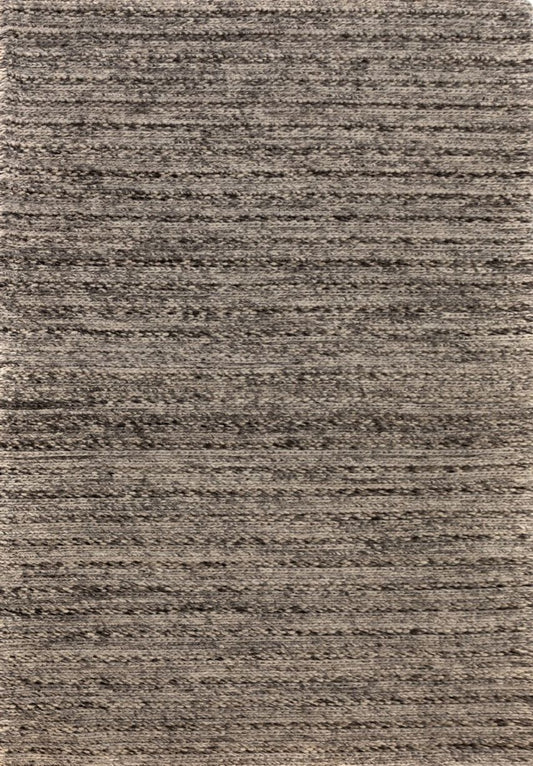 Svend Silver Grey is a contemporary hand woven braided pile wool rug.  Colour Dark Grey, Grey and Light Grey. Sizes 155 X 225, 200 X 290, 240 X 320 and 300 X 400. Full.