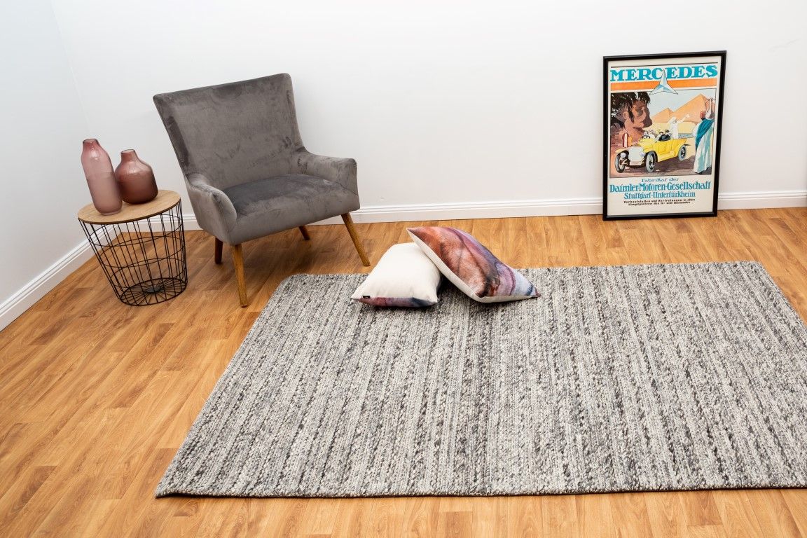 Svend Silver Grey is a contemporary hand woven braided pile wool rug.  Colour Dark Grey, Grey and Light Grey. Sizes 155 X 225, 200 X 290, 240 X 320 and 300 X 400. Life.