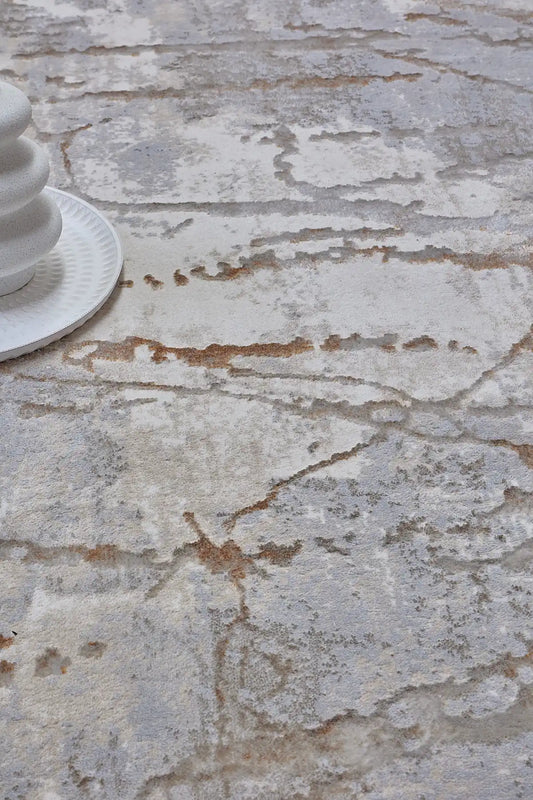 Swiss Beige is a machine-made polyester rug with an abstract modern/contemporary design. It boasts a 7-9mm pile height. Colours white and silver with beige accents. Sizes 160 X 230, 200 X 290, 240 X 340 and 300 X 400. Life.