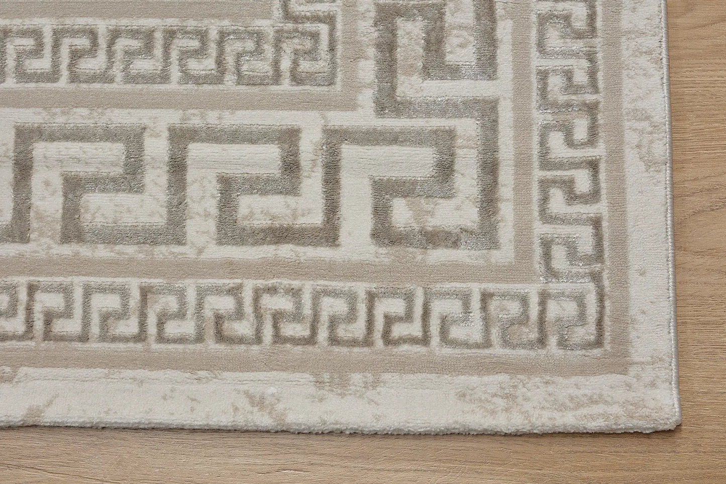 Swiss Border is a machine-made polyester rug with an abstract modern/contemporary design. It boasts a 7-9mm pile height. Colours light grey and silver accents. Sizes 160 X 230, 200 X 290, 240 X 340 and 300 X 400. Corner.