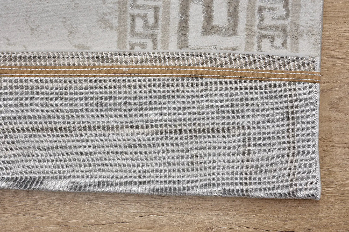 Swiss Border is a machine-made polyester rug with an abstract modern/contemporary design. It boasts a 7-9mm pile height. Colours light grey and silver accents. Sizes 160 X 230, 200 X 290, 240 X 340 and 300 X 400. Fold.