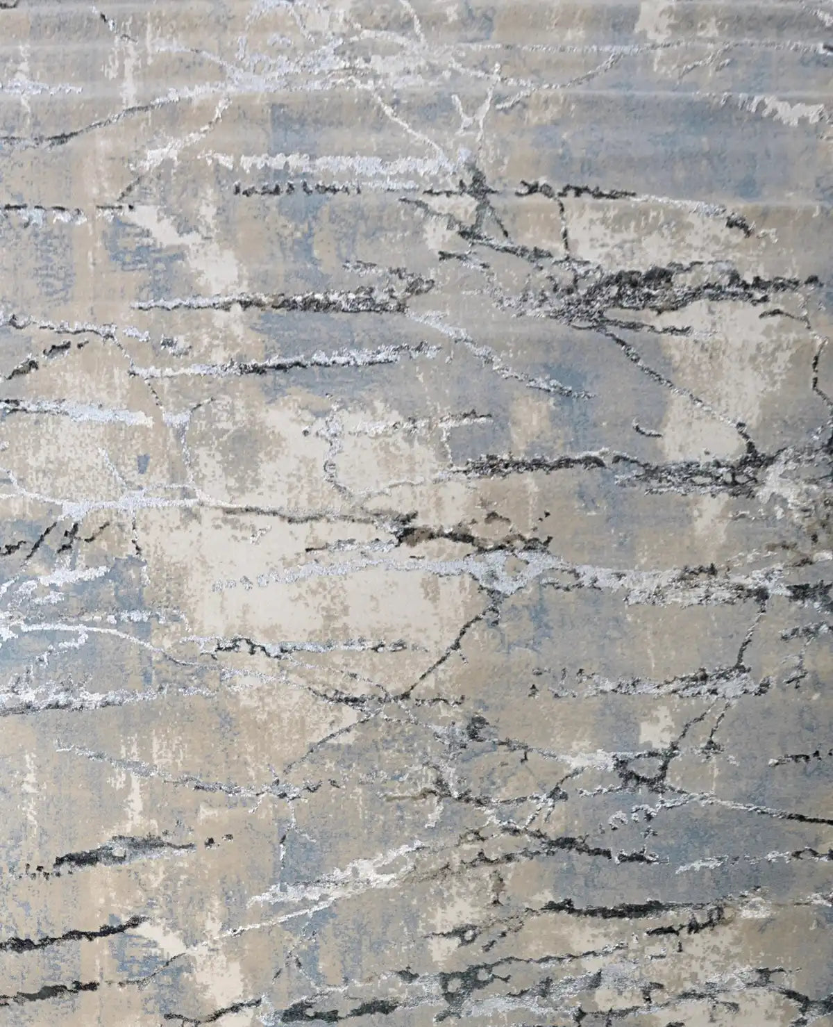 Swiss Silver is a machine-made polyester rug with an abstract modern/contemporary design. It boasts a 7-9mm pile height. Colours silver with grey and blue accents. Sizes 160 X 230, 200 X 290, 240 X 340 and 300 X 400. Full.