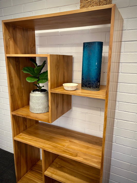 The Taurus Bookshelf. Crafted from A grade teak, featuring multiple shelve for showcasing your items. Colour Natural Teak. Measures 1700 Height x 400 Depth x 900 Width. Angle.