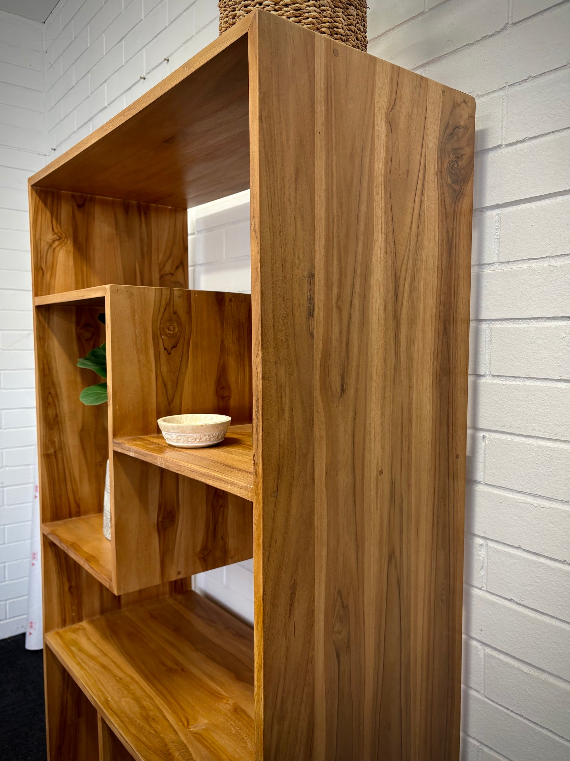 The Taurus Bookshelf. Crafted from A grade teak, featuring multiple shelve for showcasing your items. Colour Natural Teak. Measures 1700 Height x 400 Depth x 900 Width. Side.