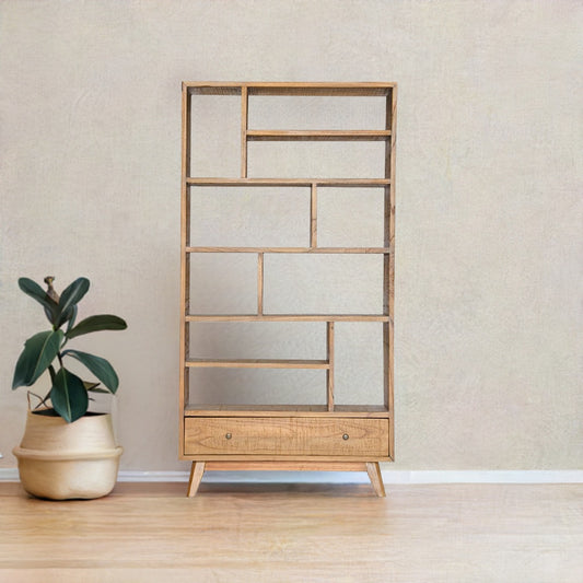 The Taurus 1 Drawer Bookshelf. Multi pigeon holes with 1 drawer at the bottom. Constructed from teak. Measures 1900 Height x 350 Depth x 1000 Wide. Colour natural. Styled.