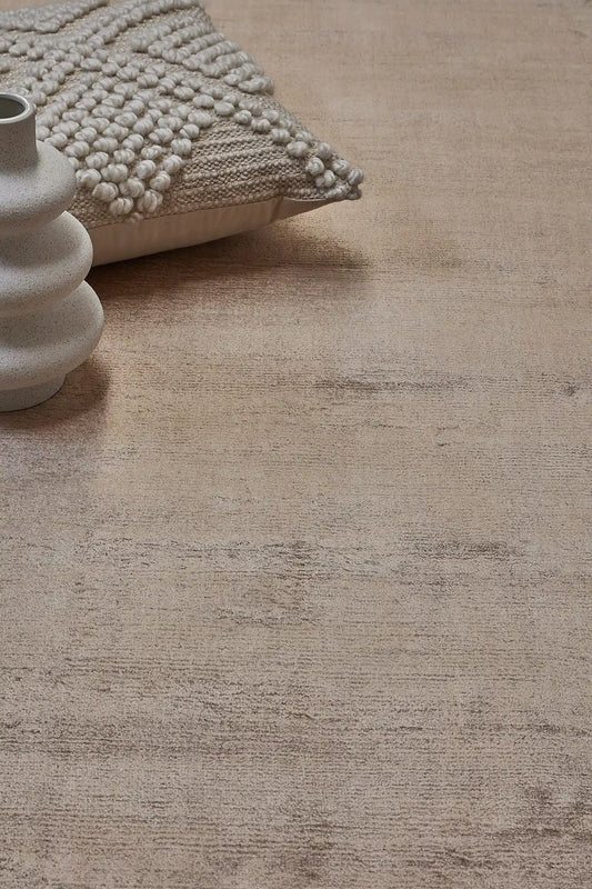 Tempo Brown is a hand-loomed and hand tufted rug. Crafted with bamboo silk, it offers medium texture and has a pile height of 10-12mm. Colour light brown. Sizes 160 X 230, 200 X 290 and 240 X 340. Life.