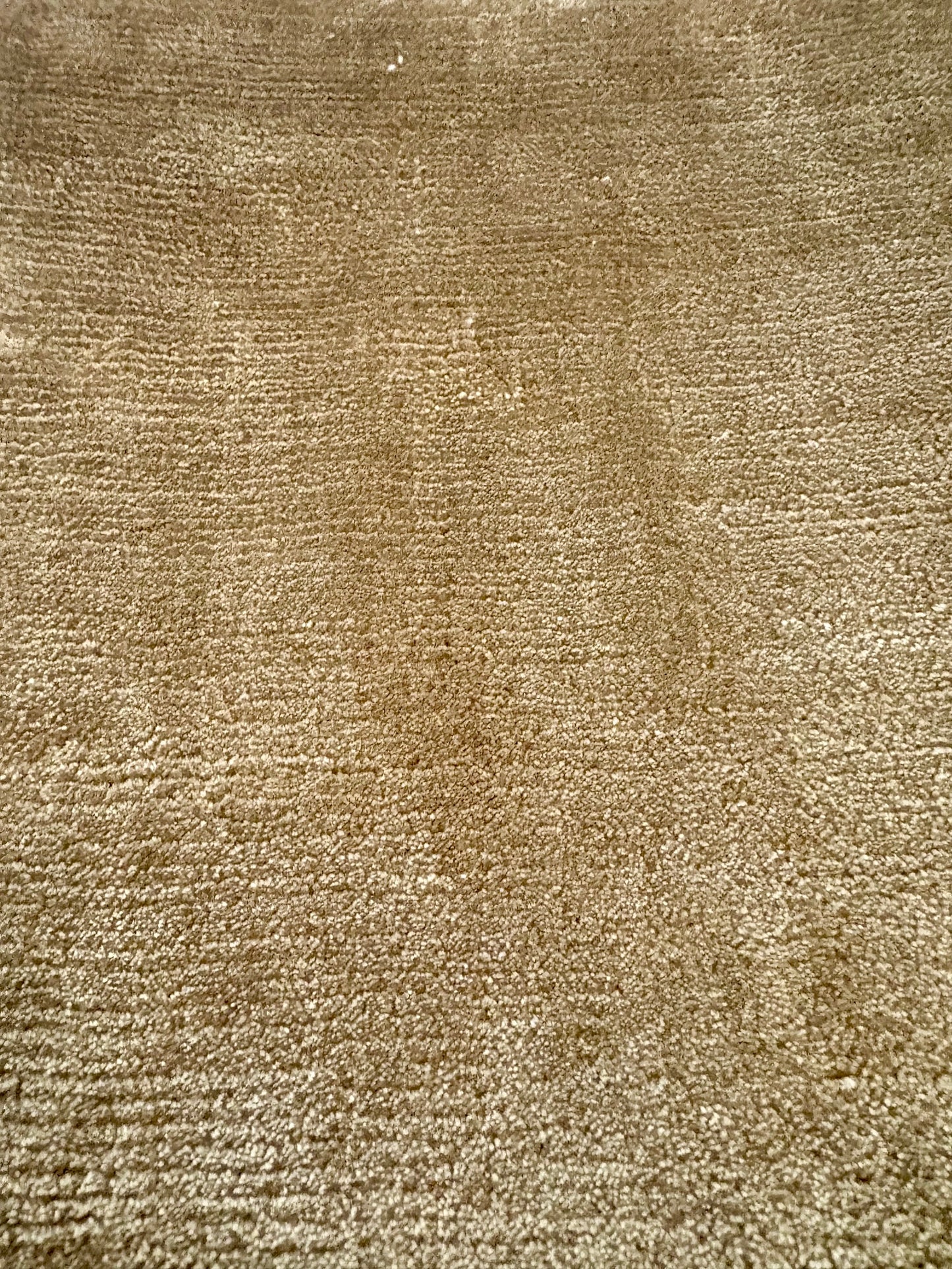 Tempo Brown is a hand-loomed low-cut piled rug. Crafted with bamboo silk, it offers medium texture and has a pile height of 10-12mm. Colour light brown. Sizes 160 X 230, 200 X 290 and 240 X 340. Non Sheen side.