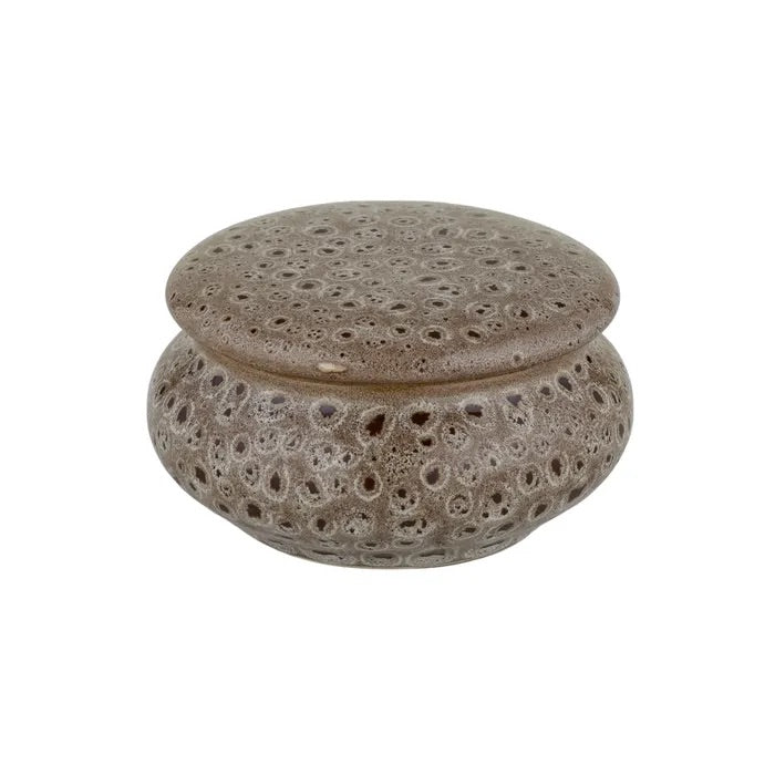 The Terra Ceramic Candle Jar, features a main dish for the candle and a lid to cover when not in use.  Colours rustic grey with black specs. Measures 12.5 Diameter X 7 Height. Front Plain.