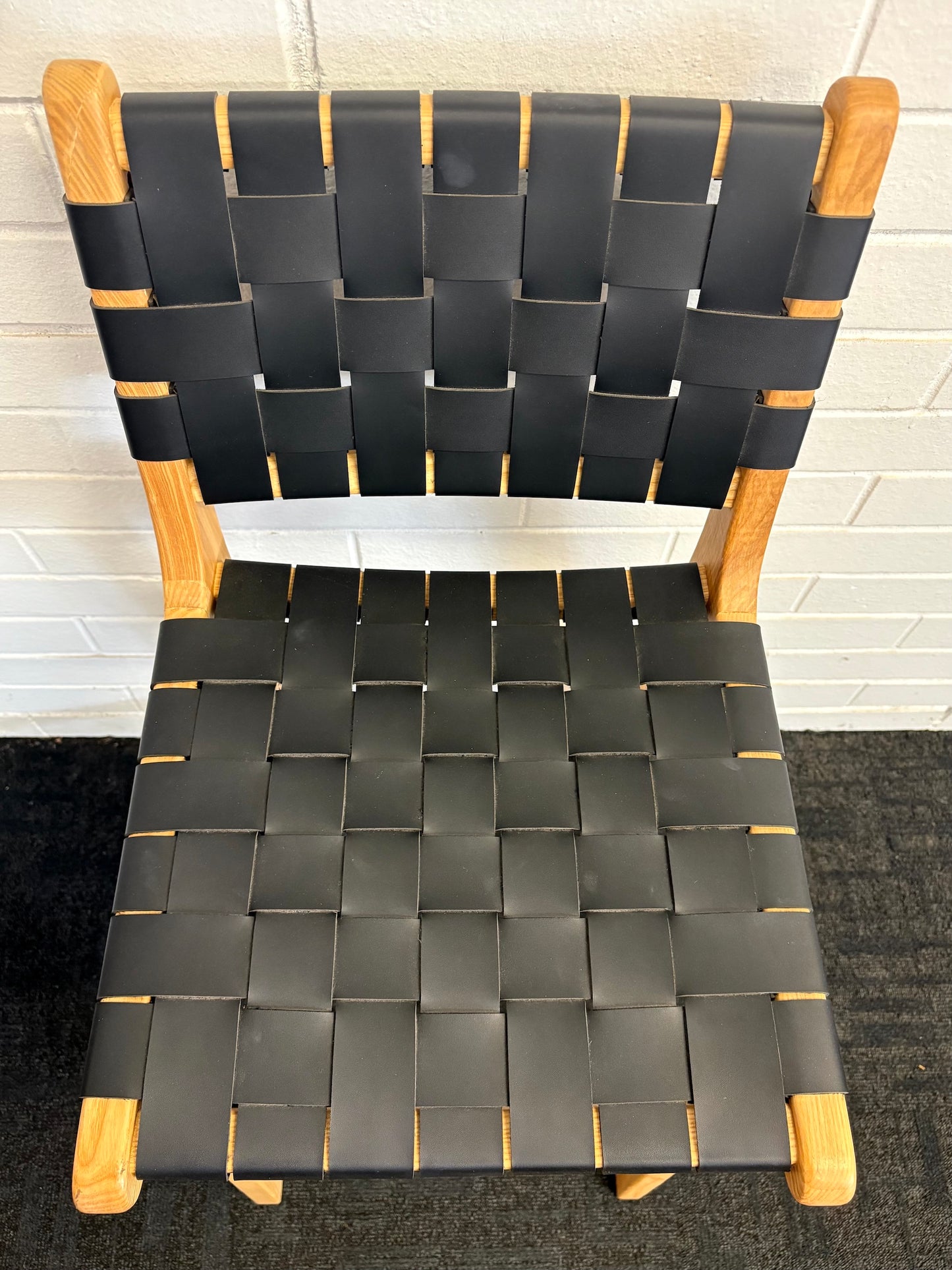 The Thames w/back black leather barstool features black strapped saddle leather on an ash frame. measures 410 wide X 320 depth X 660 seat height. Top.