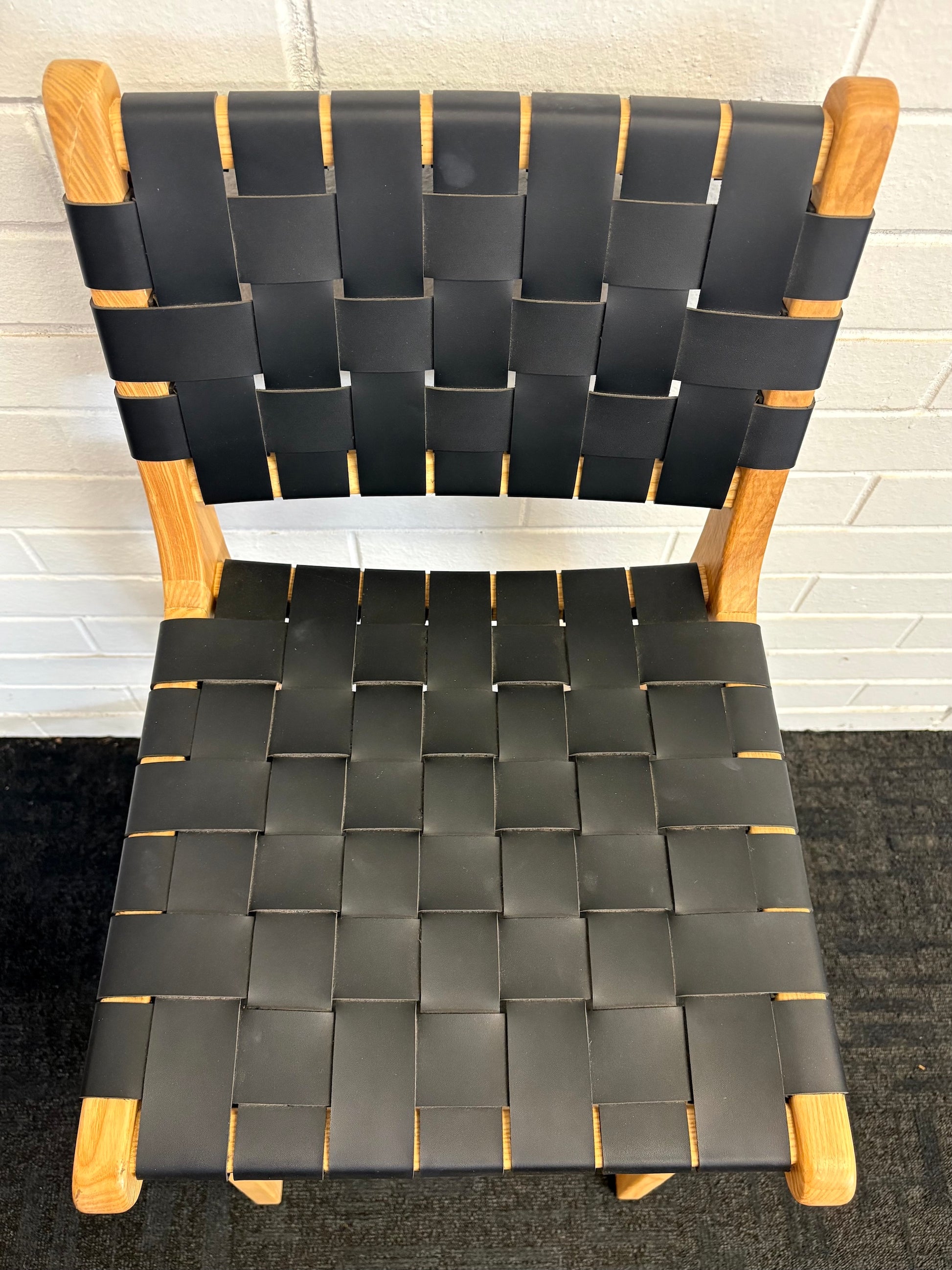 The Thames w/back black leather barstool features black strapped saddle leather on an ash frame. measures 410 wide X 320 depth X 660 seat height. Top.