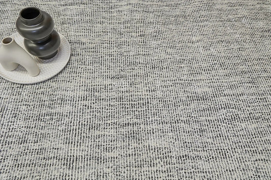 Toro Dark Grey is a hand-loomed, hand-knotted rug with a contemporary multi-fleck design. Wool and silky viscose are blended to create a soft feel with its 10-12mm pile height. Colour light grey with dark grey accents. Sizes 160 X 230, 200 X 290 and 240 X 340. Life.