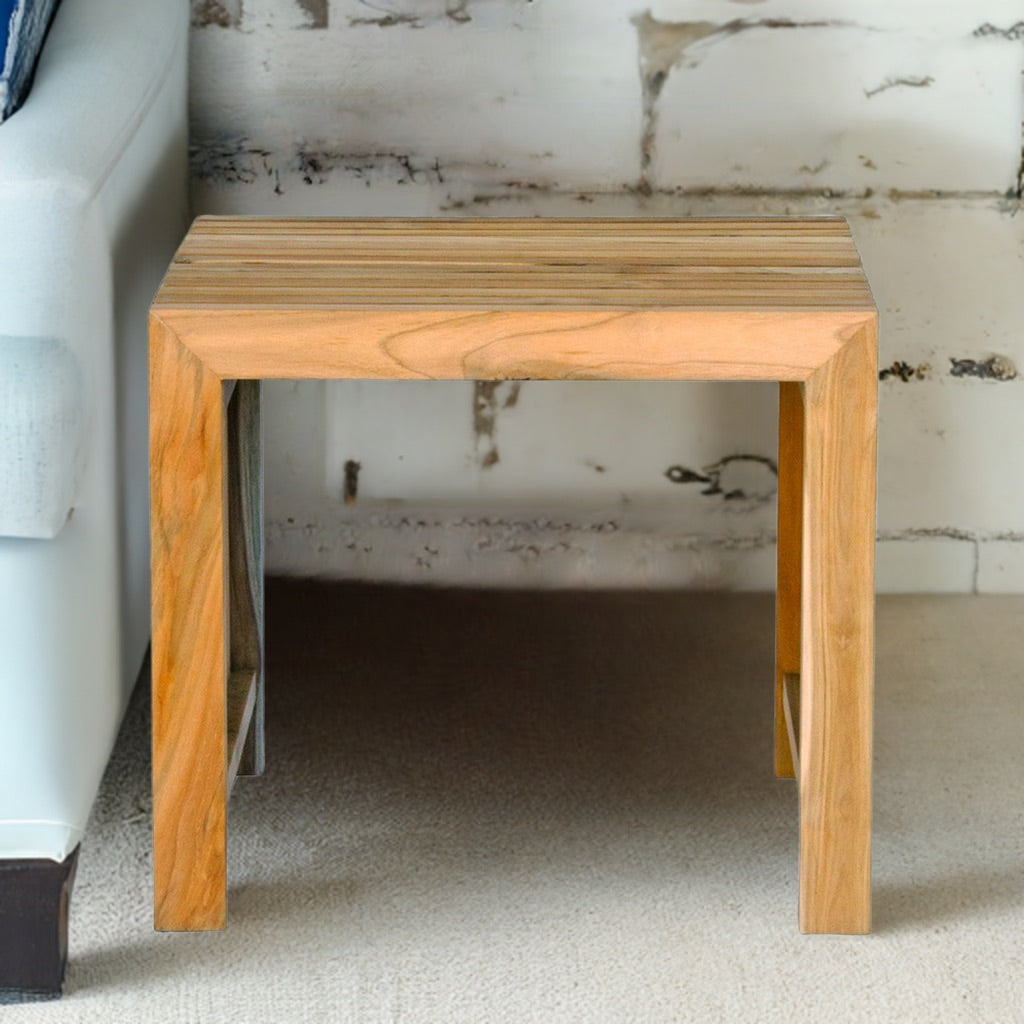 The Usuki Side Tables, is crafted from sustainable solid Teak and feature a slatted open design. Colour natural. Measures 500 wide x 400 depth x 450 height. Styled.