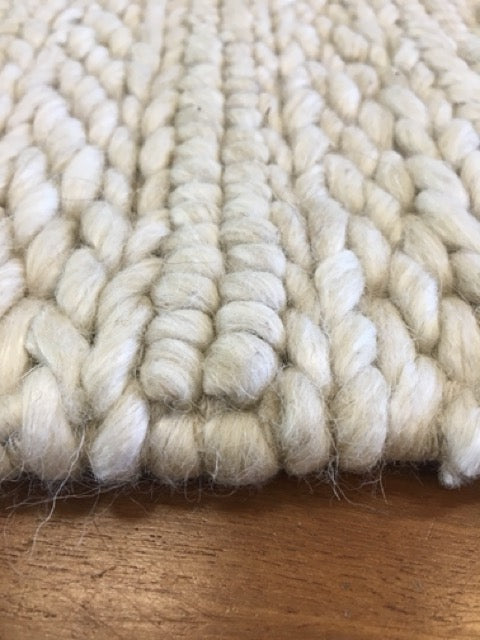 Vaucluse Cream is a textured hand woven loop pile and braided loop wool and viscose rug. It features a contemporary design. Colour Cream. Sizes 155 X 225, 200 X 290, 240 X 340 and 300 X 400. Angle.