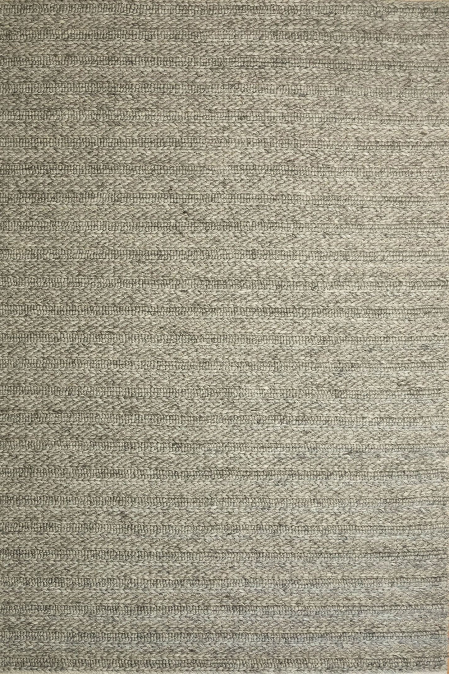 Vaucluse Dark Grey is a textured hand woven loop pile and braided loop wool and viscose rug. It features a contemporary design. Colour Dark Grey with Light Grey accents. Sizes 155 X 225, 200 X 290, 240 X 340 and 300 X 400. Full.