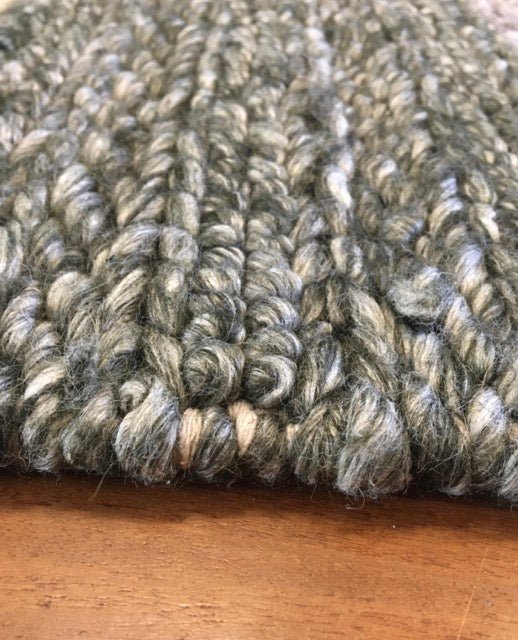 Vaucluse Green is a textured hand woven loop pile and braided loop wool and viscose rug. It features a contemporary design. Colours Dark Green with Light Grey accents. Sizes 155 X 225, 200 X 290, 240 X 340 and 300 X 400. Angle.
