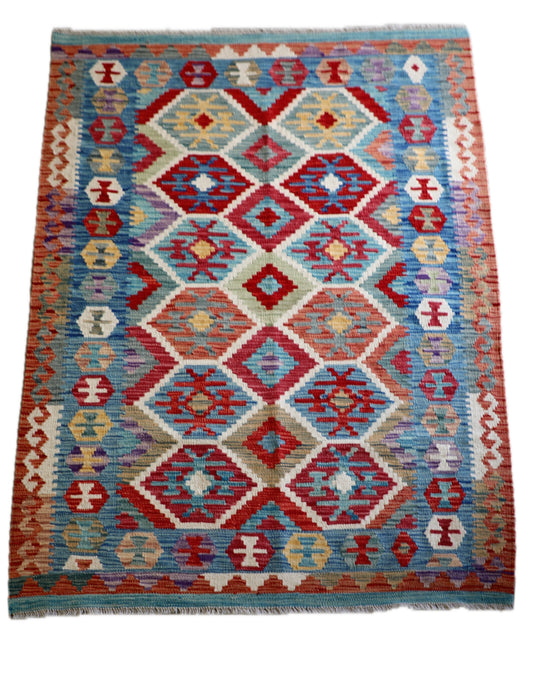 The Afghan Hand Woven Khyber Kilim - 129 X 178.  Crafted using traditional vegetable dyed wool, and featuring traditional geometric designs. Colours, brown, red, blue, cream, teal. Size 129 X 178. Cover.