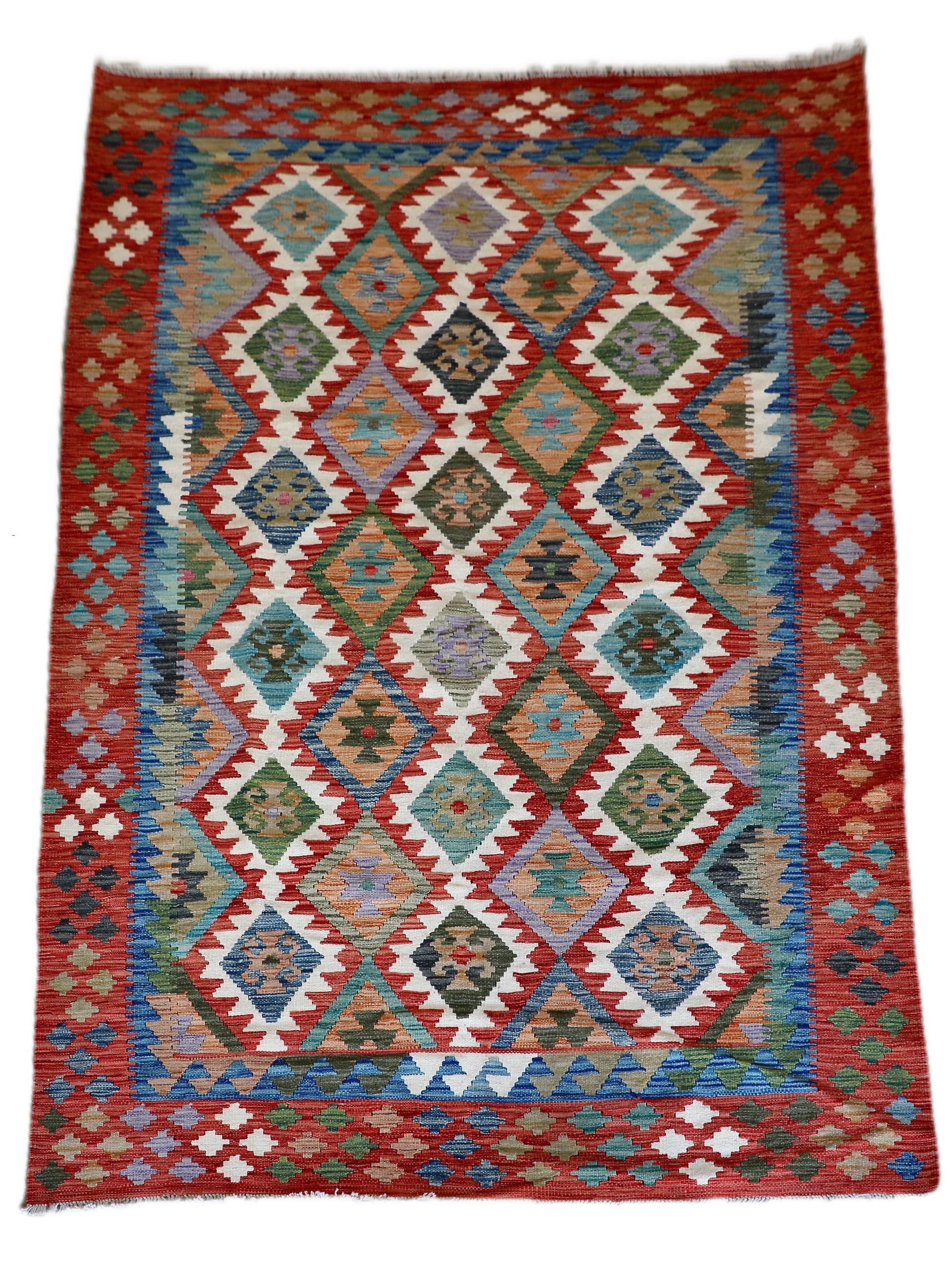 The Afghan Hand Woven Khyber Kilim - 172 X 250. Crafted using traditional vegetable dyed wool, and featuring traditional geometric designs. Colours, cream, reds, greens, blues, oranges. Size 172 X 250. Cover.