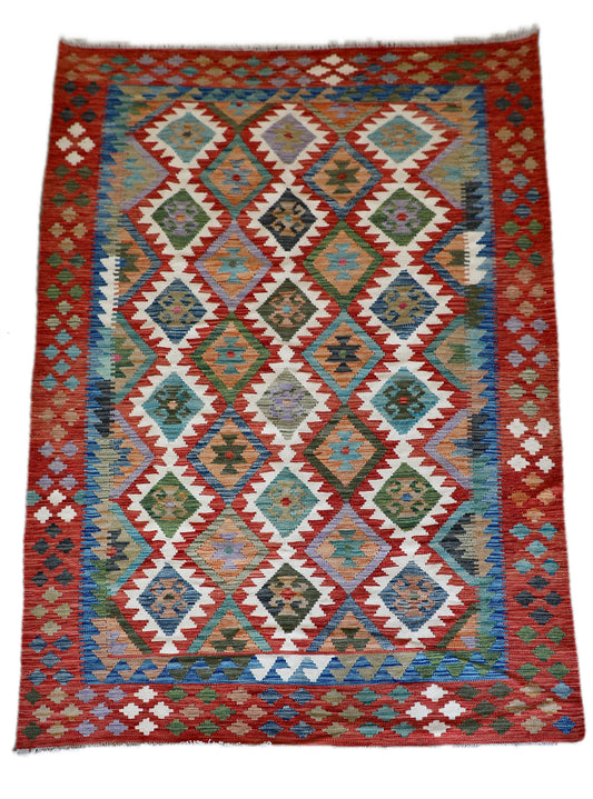 The Afghan Hand Woven Khyber Kilim - 172 X 250. Crafted using traditional vegetable dyed wool, and featuring traditional geometric designs. Colours, cream, reds, greens, blues, oranges. Size 172 X 250. Cover.