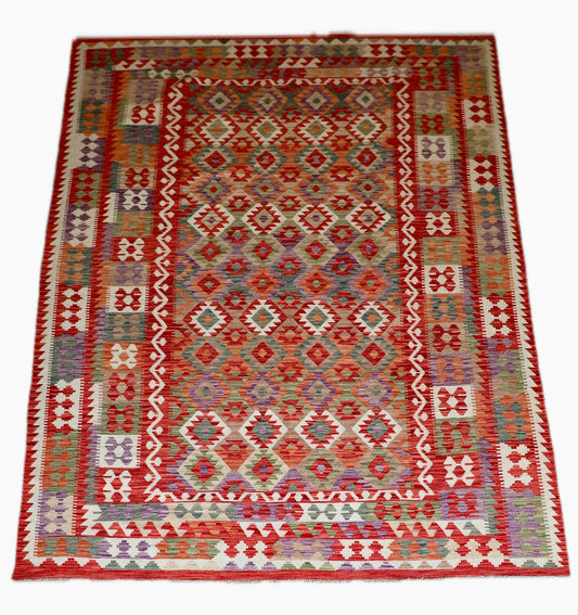 The Afghan Hand Woven Khyber Kilim - 252 X 345. Crafted using traditional vegetable dyed wool, and featuring traditional geometric designs. Colours, Oranges, reds, creams, teals. Size 252 X 345. Cover.