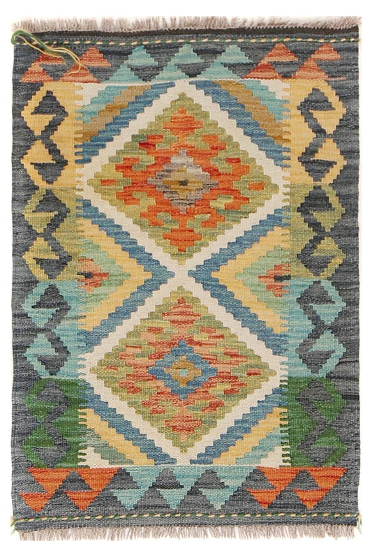  The Afghan Hand Woven Khyber Kilim - 60 X 87. Crafted using traditional vegetable dyed wool, and featuring traditional geometric designs. Colours, dark greys, beiges, blues, creams, light greens, light blues and yellows. Size 60 X 87. Cover.