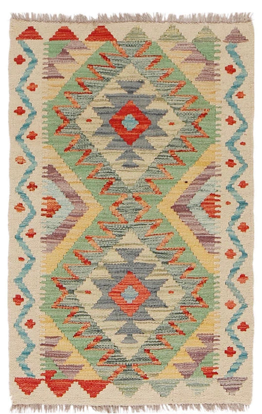 The Afghan Hand Woven Khyber Kilim 60 X 90. Crafted using traditional vegetable dyed wool, and featuring traditional geometric designs. Colours, beige, greens, light blues, yellows and reds. Size 60 X 90. Cover.