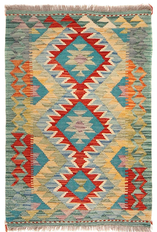 The Afghan Hand Woven Khyber Kilim - 60 X 91. Crafted using traditional vegetable dyed wool, and featuring traditional geometric designs. Colours, Greens, beiges, yellows, creams, oranges, light blues. Size 60 X 91. Cover.