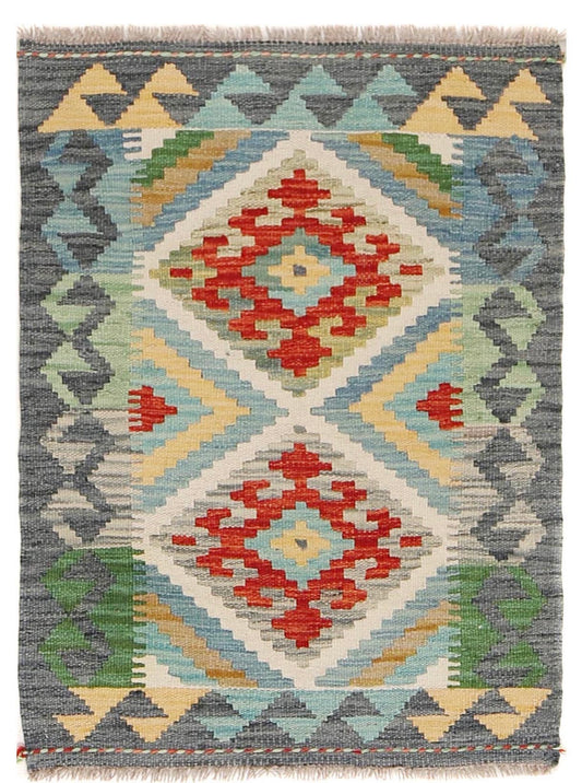 The Afghan Hand Woven Khyber Kilim - 60 X 88. Crafted using traditional vegetable dyed wool, and featuring traditional geometric designs. Colours, greys, creams, light blues, reds and orange. Size 60 wide X 88 length. Cover.