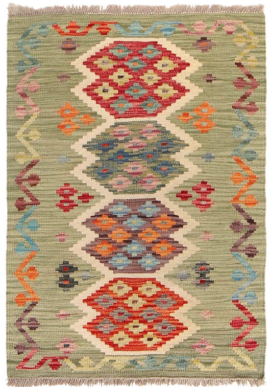  The Afghan Hand Woven Khyber Kilim - 65 X 92. Crafted using traditional vegetable dyed wool, and featuring traditional geometric designs. Colours, light greens, light blues, reds, beiges, creams, oranges and yellows. Size 65 X 92. Cover.