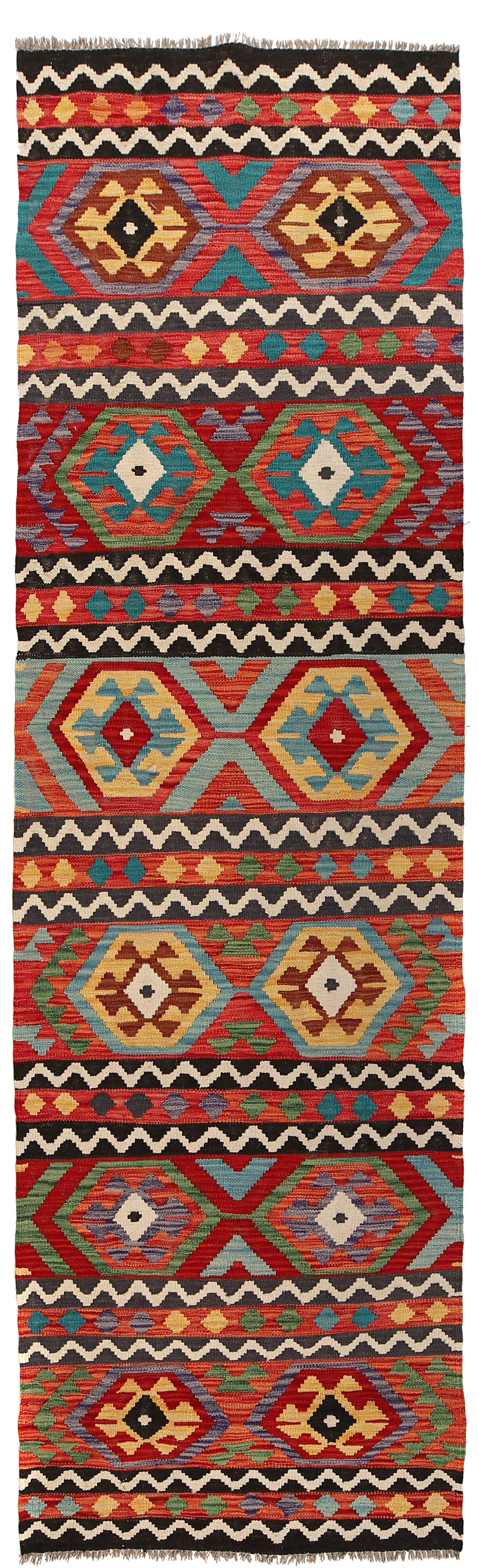 The Afghan Hand Woven Khyber Kilim Runner - 84 X 300.  Crafted using traditional vegetable dyed wool, and featuring traditional geometric designs. Colours, reds, yellows, creams, beiges, oranges, light greens and more. Measures 84 wide X 300 long. Cover.