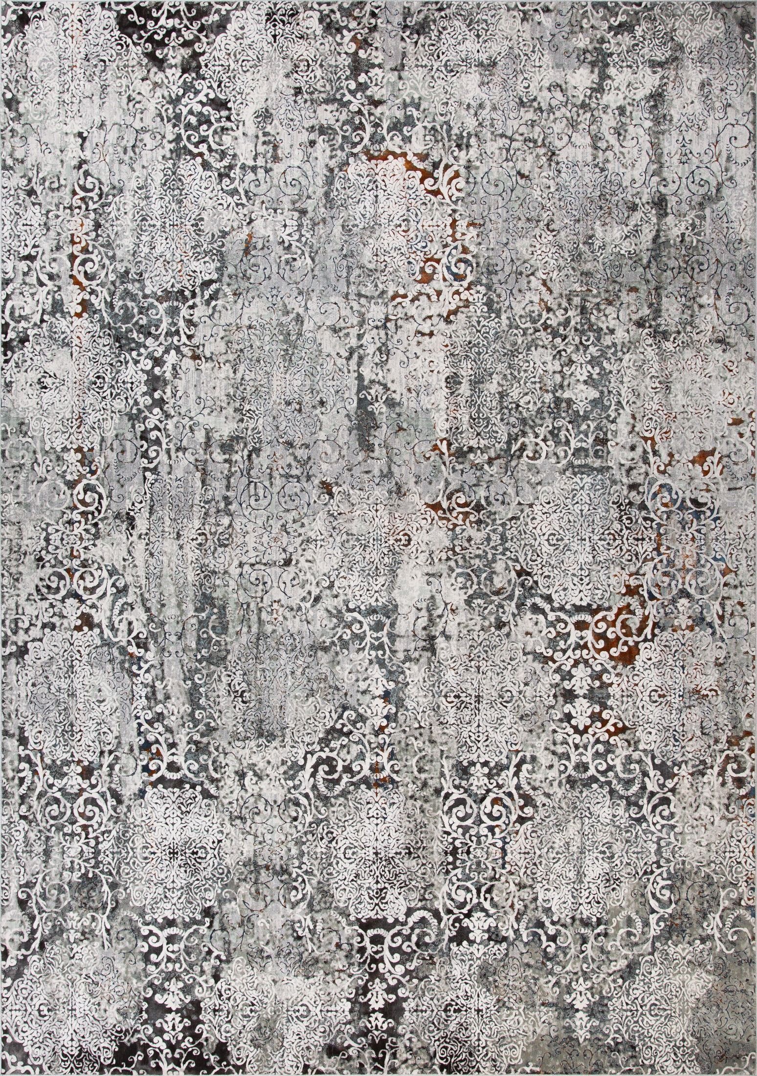 Victoria Cameo 5770 is a premium machine made rug. Its 2 million polyester points per square meter, give it a luxurious soft feel. Featuring a traditional/tribal design. Colours Light Grey, with grey and black accents. Sizes 160 X 235, 200 X 285, 240 X 330 and 300 X 380. Full.