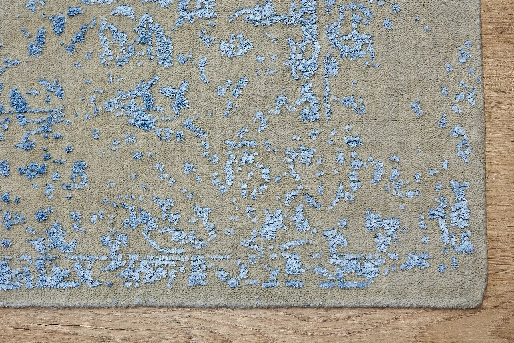Victoria Denim is hand-loomed rug from silky viscose. Featuring a vintage distressed traditional design and medium texture. Has a pile height of 10-12mm. Colour Blue and Grey.  Sizes 160 X 230, 200 X 290 and 240 X 340. Corner.
