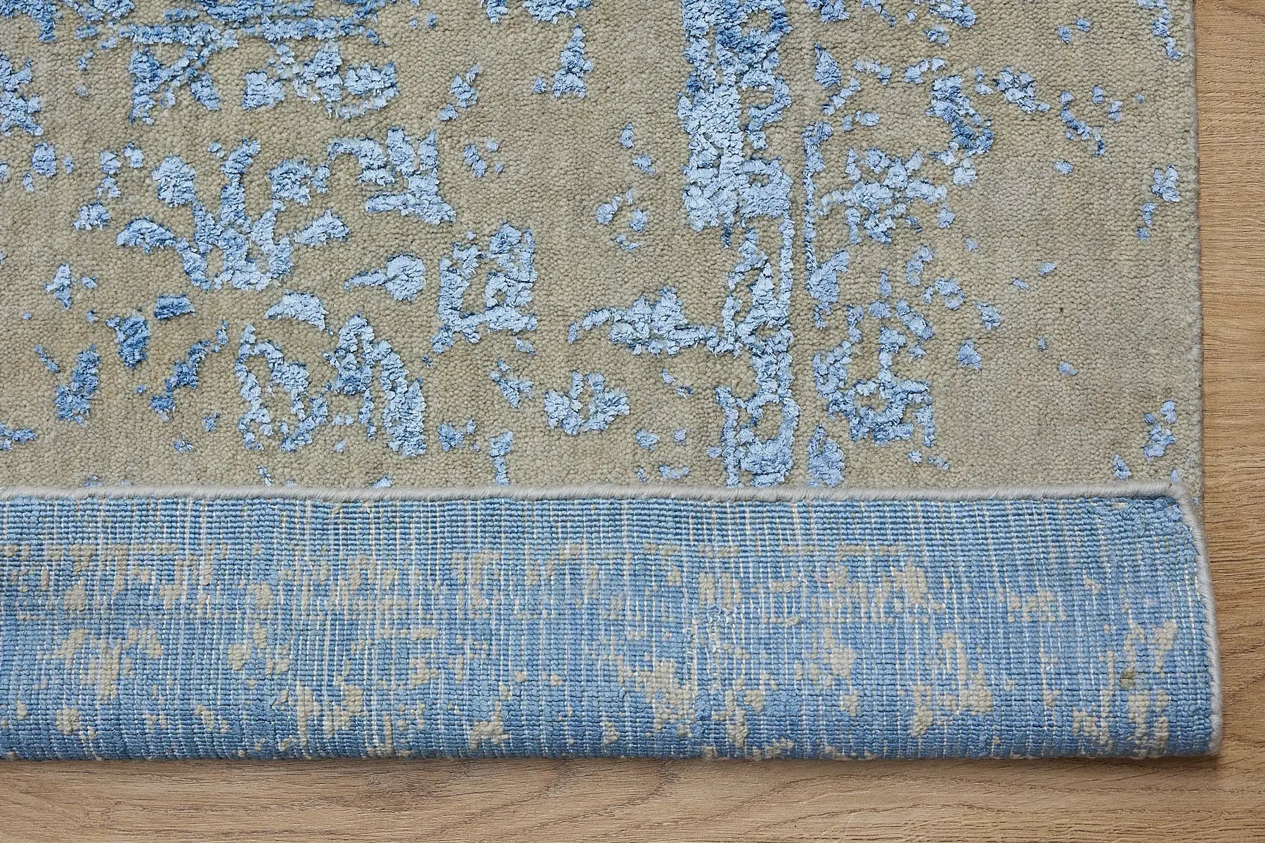 Victoria Denim is hand-loomed rug from silky viscose. Featuring a vintage distressed traditional design and medium texture. Has a pile height of 10-12mm. Colour Blue and Grey.  Sizes 160 X 230, 200 X 290 and 240 X 340. Fold.