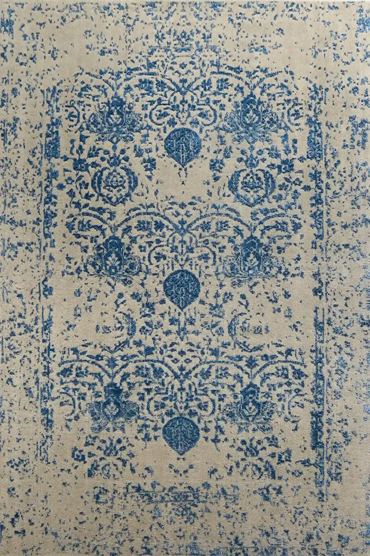 Victoria Denim is hand-loomed rug from silky viscose. Featuring a vintage distressed traditional design and medium texture. Has a pile height of 10-12mm. Colour Blue and Grey.  Sizes 160 X 230, 200 X 290 and 240 X 340. Full.
