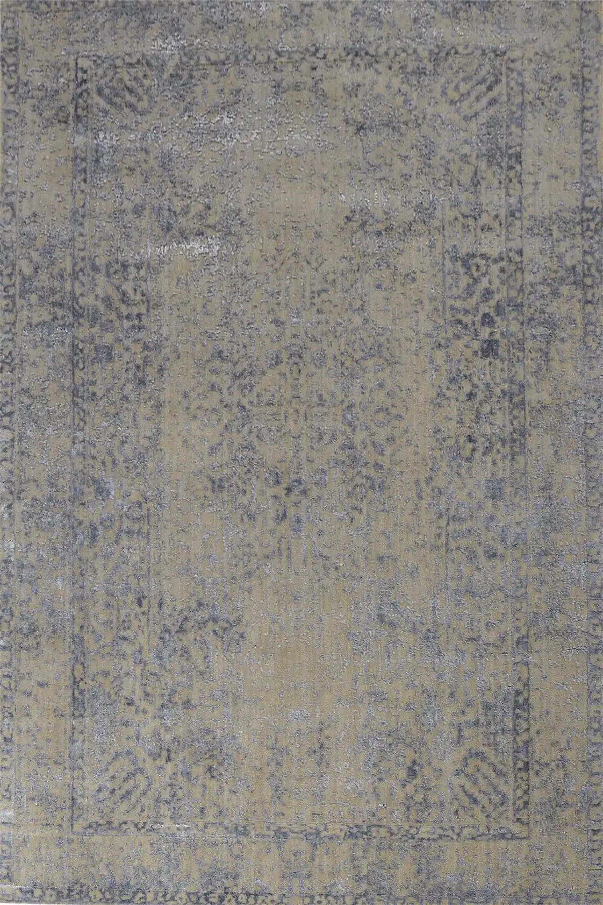 Victoria Silver is hand-loomed rug from silky viscose. Featuring a vintage distressed traditional design and medium texture. Has a pile height of 10-12mm. Colour Silver with light blue accents. Sizes 160 X 230, 200 X 290 and 240 X 340. Full.