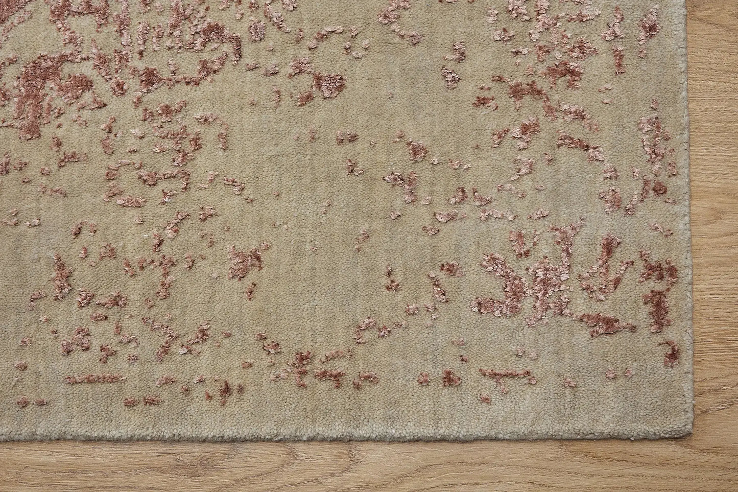 Victoria Terra is hand-loomed rug from silky viscose. Featuring a vintage distressed traditional design and medium texture. Has a pile height of 10-12mm. Colour Beige with Red Terracotta accents. Sizes 160 X 230, 200 X 290 and 240 X 340. Corner.