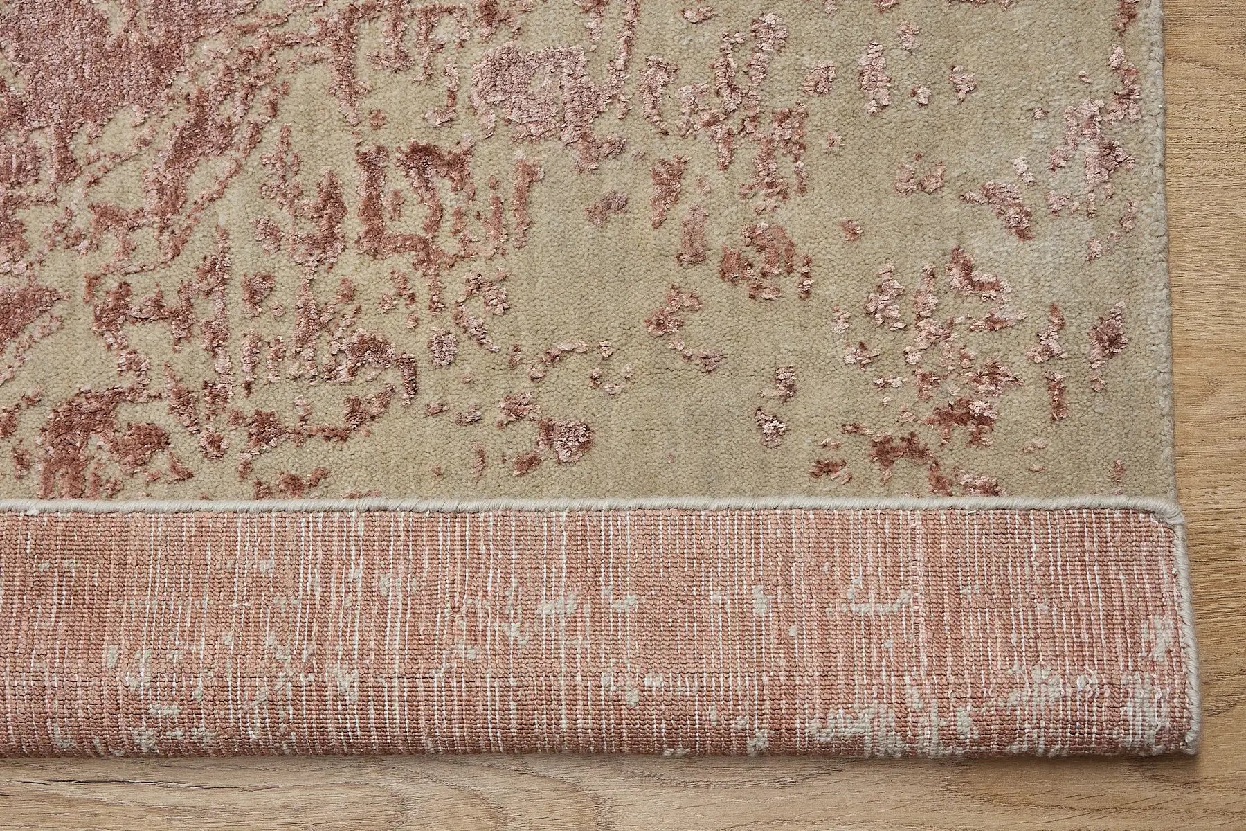 Victoria Terra is hand-loomed rug from silky viscose. Featuring a vintage distressed traditional design and medium texture. Has a pile height of 10-12mm. Colour Beige with Red Terracotta accents. Sizes 160 X 230, 200 X 290 and 240 X 340. Fold.