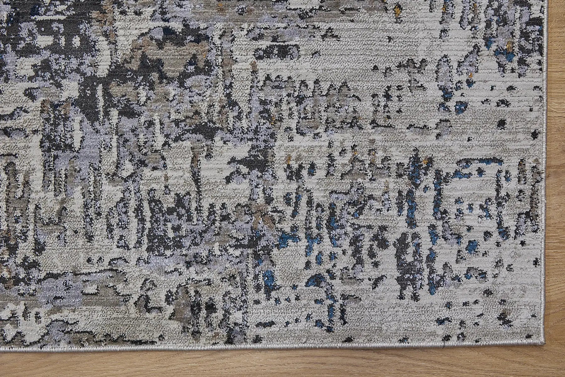 Vienna Blue is a polyester machine made modern/contemporary rug.  It features a 7-9mm Pile height for a soft luxurious feel.  Colours white, silver, with blue and orange beige accents. Sizes 160 X 230, 200 X 290, 240 X 340 and 300 X 400. Corner.