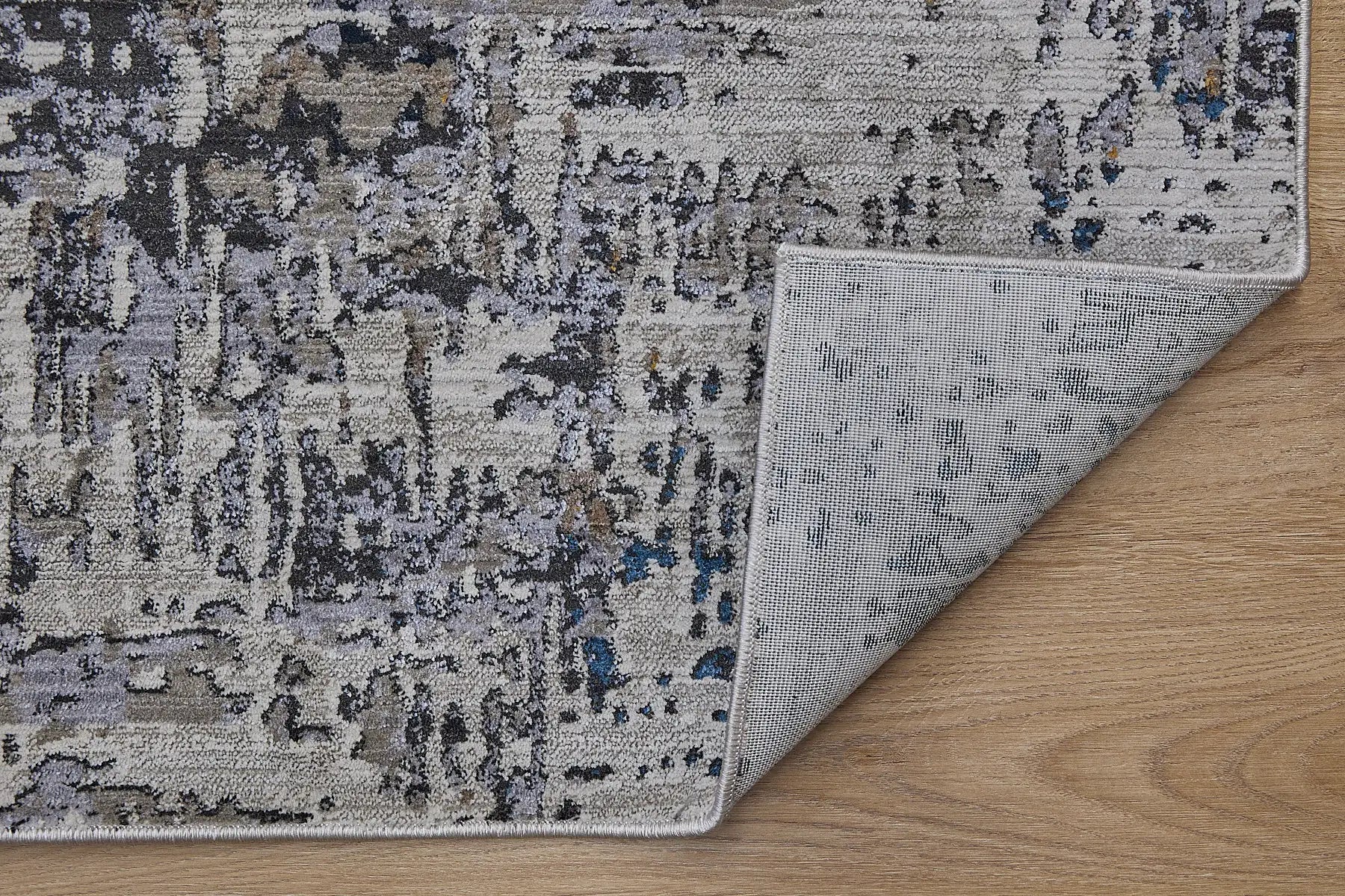 Vienna Blue is a polyester machine made modern/contemporary rug.  It features a 7-9mm Pile height for a soft luxurious feel.  Colours white, silver, with blue and orange beige accents. Sizes 160 X 230, 200 X 290, 240 X 340 and 300 X 400. Fold.