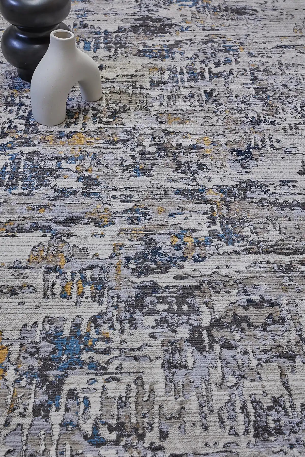 Vienna Blue is a polyester machine made modern/contemporary rug.  It features a 7-9mm Pile height for a soft luxurious feel.  Colours white, silver, with blue and orange beige accents. Sizes 160 X 230, 200 X 290, 240 X 340 and 300 X 400. Life.
