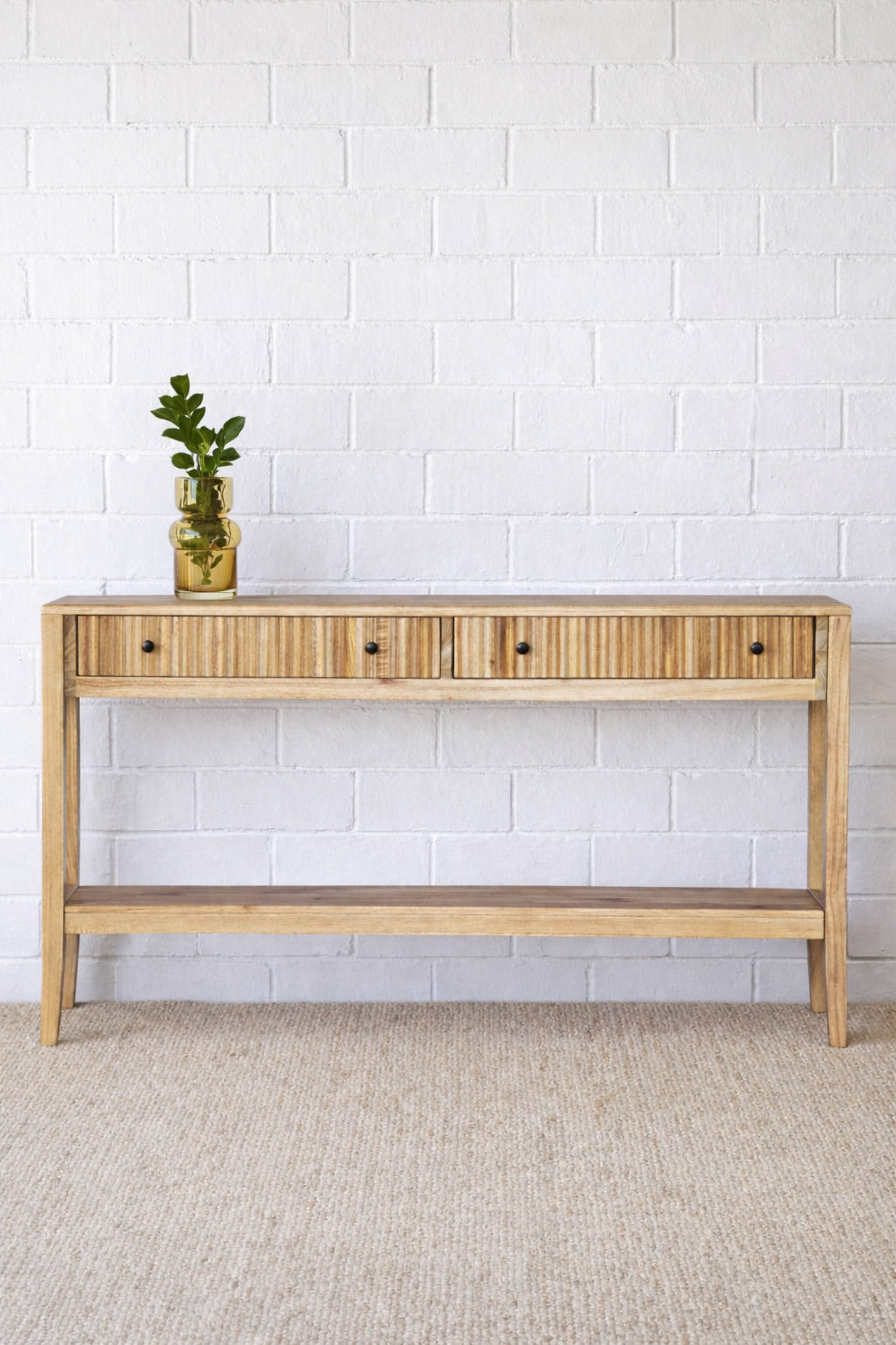 The Vienna - 2 Drawer Natural 1500 Console, natural, brings a contemporary feel with its sleek design and textured drawer face. Built with sustainable white cedar its 2 drawers sit on wooden runners. Colour natural. Measures 1500 length X 250 depth X 750 height. Styled.